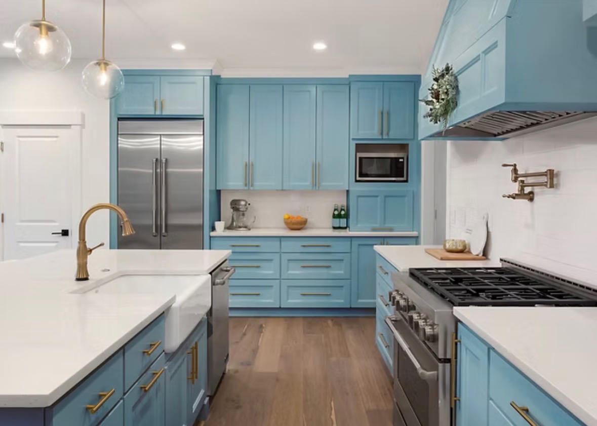 Custom white shaker cabinetry with brass hardware, built and installed by WDC Design Center